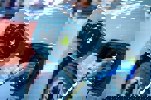 An electric vehicle plugged into a charging station.